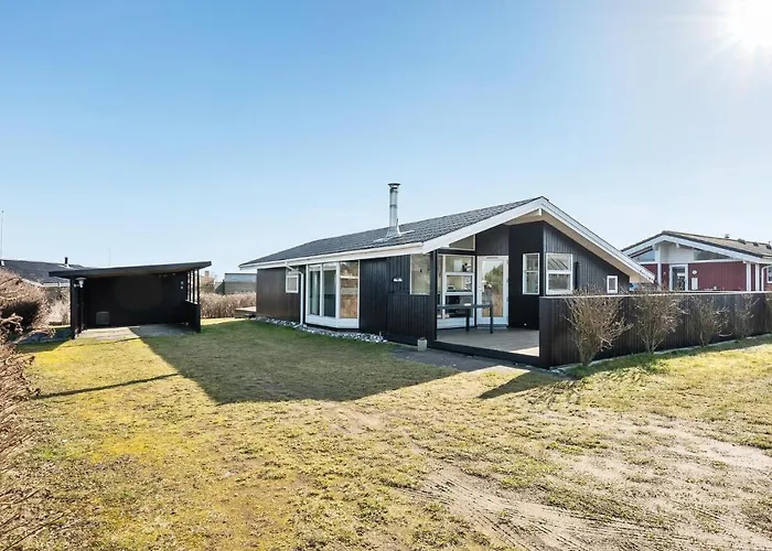 As Strandby Juelsminde X Casa de Férias